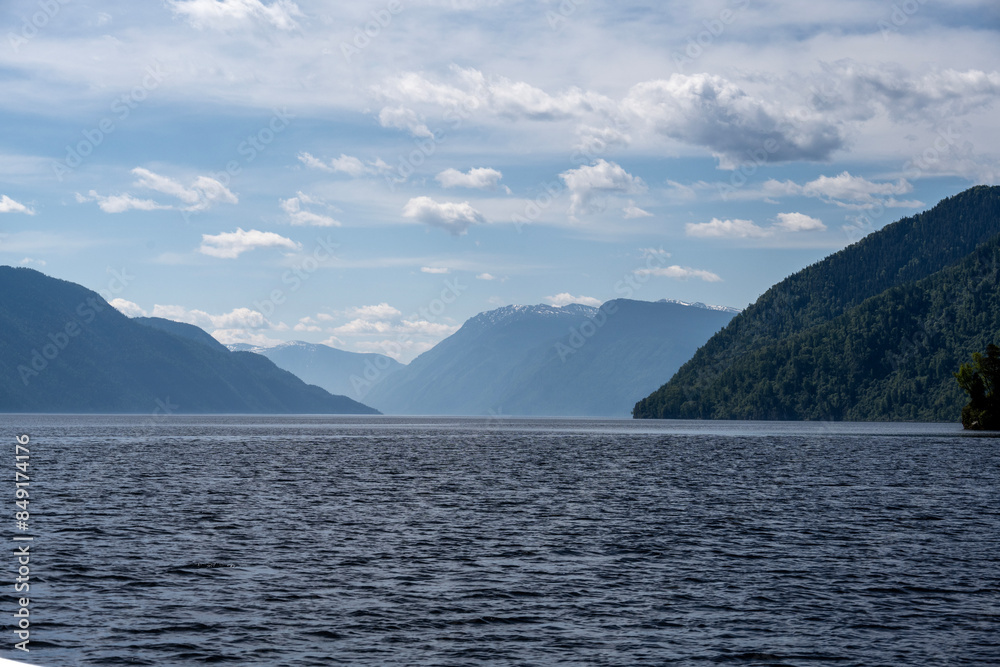 typical summer landscape with mountains, lake and forest in the area of Lake Teletskoye in Altai typical summer landscape with mountains, lake and forest in the area of Lake Teletskoye in Altai