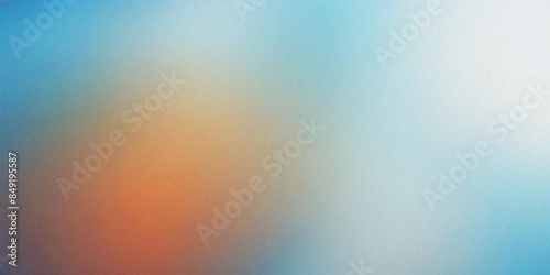 Blurred gradient background with soft blue tones and orange hues