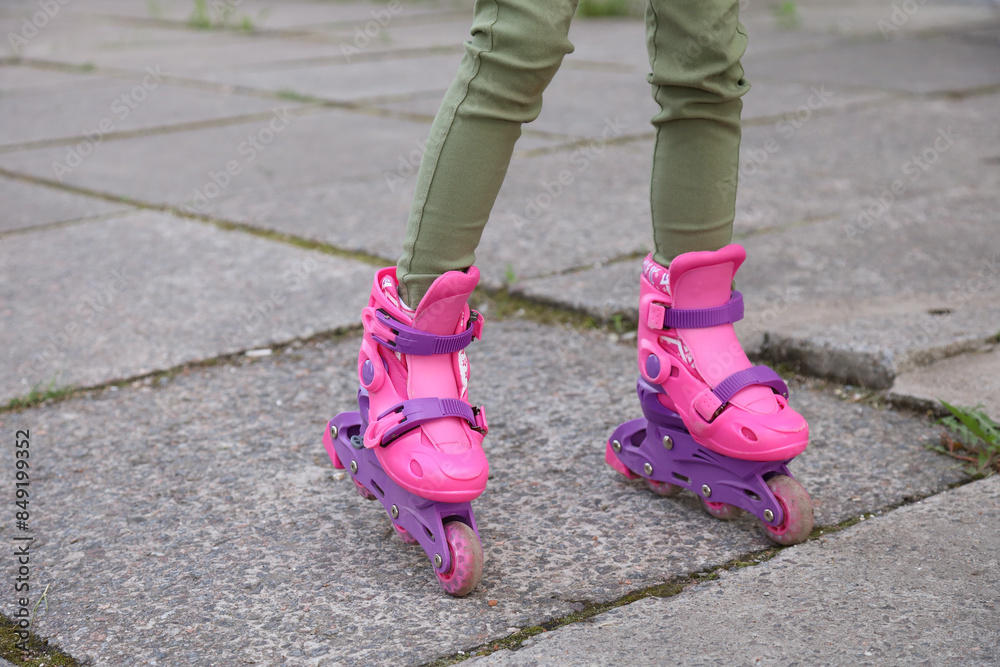 Close-up Of Legs Wearing Roller Skating Shoe, Outdoors lifestyle portrait Close-up Of Legs Wearing Roller Skating Shoe, Outdoors lifestyle portrait