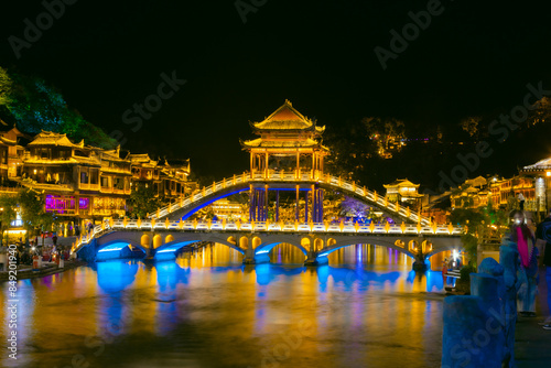 Phoenix Ancient Town, Xiangxi, Hunan Province - panoramic night view of the city scenery photo