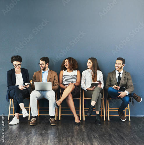 Bild auf Leinwand Business people, technology and conversation in waiting room for interview, meeting or recruitment on chair