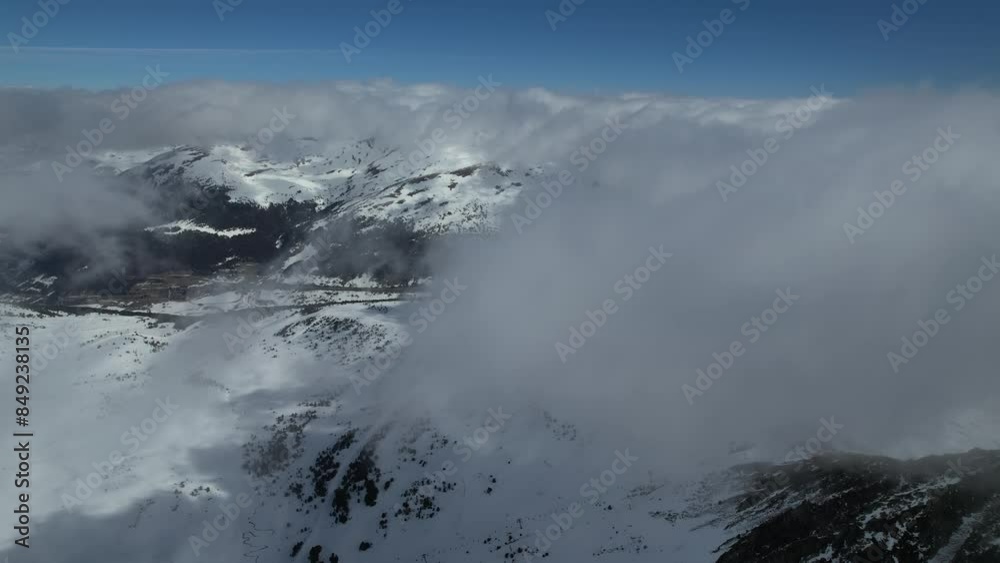 Aerial video over El Paz de la Casa ski resort, Andorra in a snowy winter Aerial video over El Paz de la Casa ski resort, Andorra in a snowy winter
