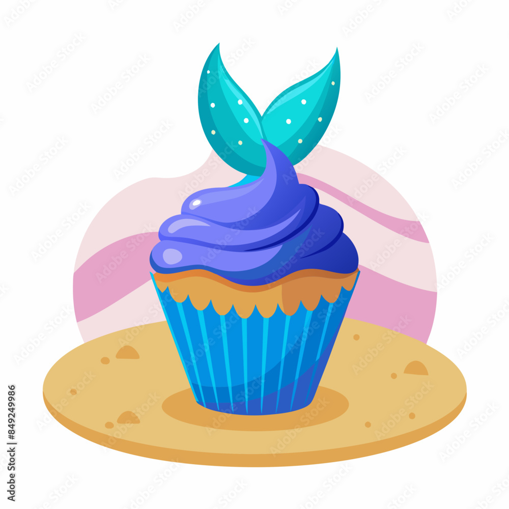 A cupcake with sparkling blue frosting and a mermaid tail topper rests on a sandy beach A cupcake with sparkling blue frosting and a mermaid tail topper rests on a sandy beach