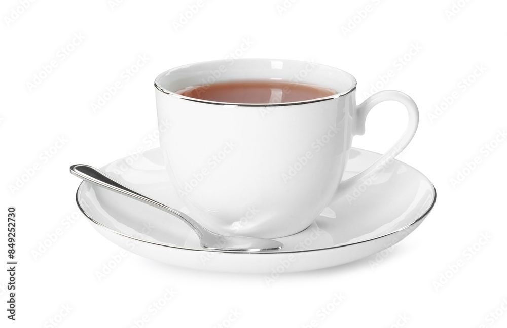 Aromatic tea in cup and spoon isolated on white Aromatic tea in cup and spoon isolated on white