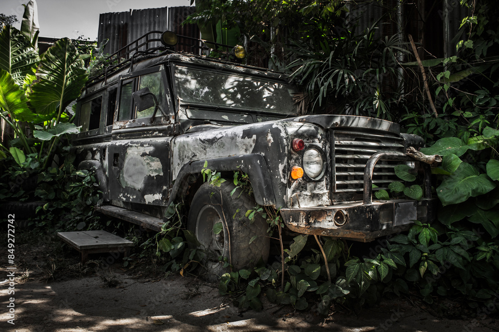 Ταπετσαρία Old broken dirty military jeep crashed into a tree in jungle tropical trees and