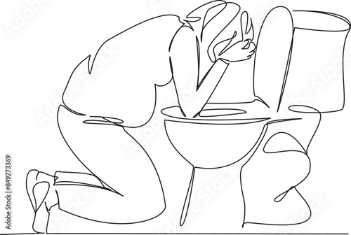 pregnant woman vomits into the toilet toxicosis