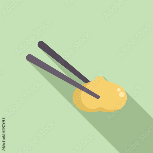 Chopsticks holding a steamed bao bun, a popular street food in many asian countries