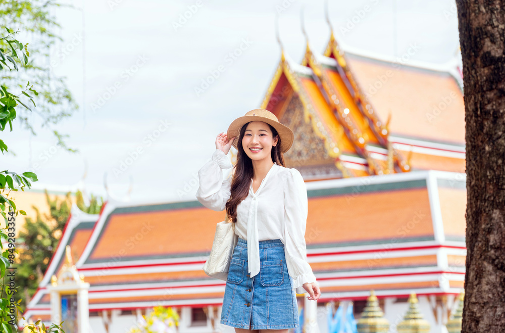 Asian chinese look tourist enjoying herself in front The Grand Palace, Bangkok, Thailand Asian chinese look tourist enjoying herself in front The Grand Palace, Bangkok, Thailand