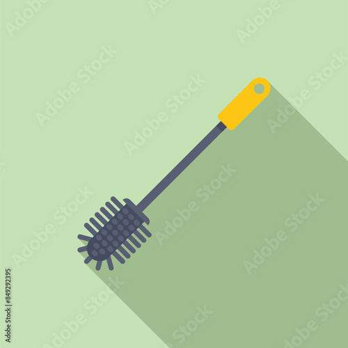 Toilet brush cleaning tool lying on green background with shadow photo