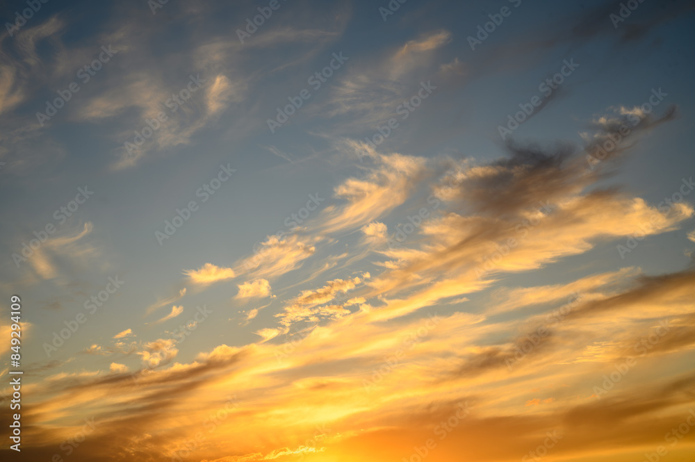 Obraz premium Vibrant sunset sky background during golden hour, sunset, golden hour, sky, background