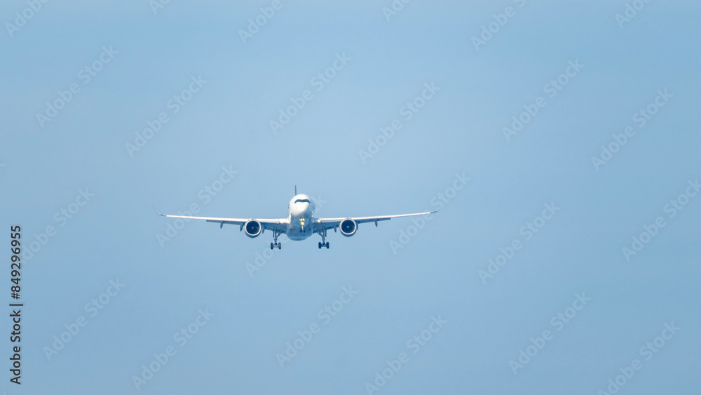 passenger airliner in the sky flies in the clouds passenger airliner in the sky flies in the clouds