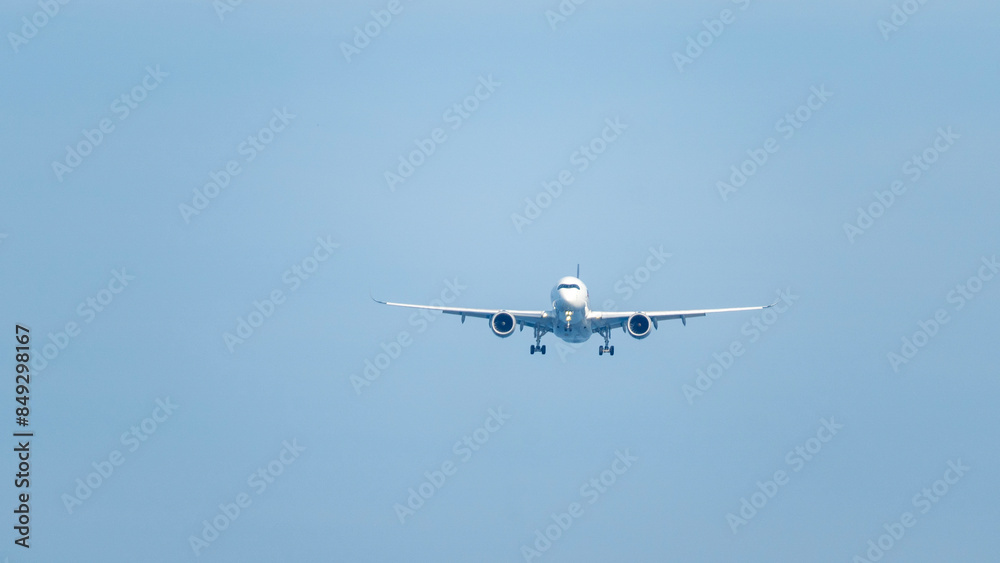 passenger airliner in the sky flies in the clouds passenger airliner in the sky flies in the clouds