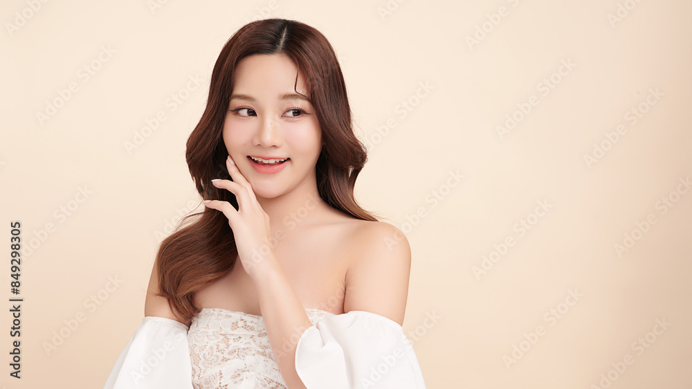 Beautiful young asian woman with clean fresh skin on beige background, Face care, Facial treatment, Cosmetology, beauty and spa, Asian women portrait. Beautiful young asian woman with clean fresh skin on beige background, Face care, Facial treatment, Cosmetology, beauty and spa, Asian women portrait.