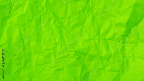 Recycled crumpled green paper texture or paper background for design with copy space for text or image