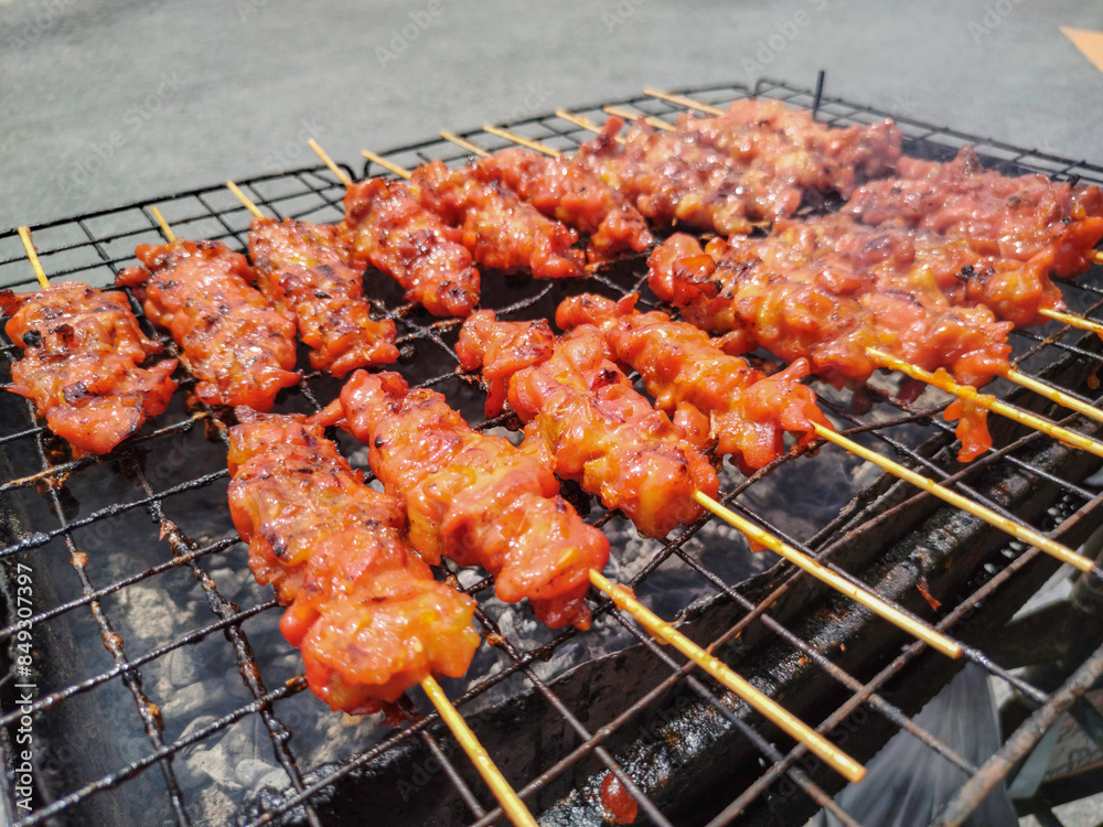 Grilled chicken, street food in Thailand Grilled chicken, street food in Thailand