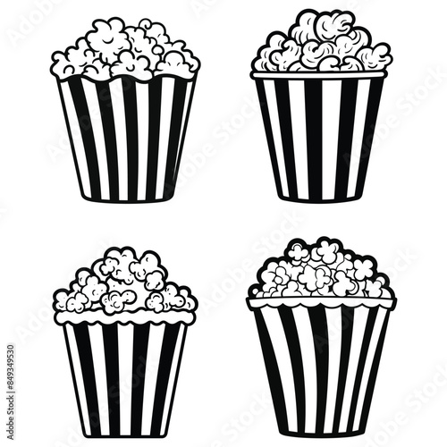 A cup of popcorn with black and white stripes