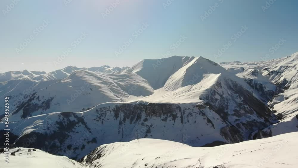 Aerial video over ski resort and snowy mountains in Gudauri Georgia Aerial video over ski resort and snowy mountains in Gudauri Georgia