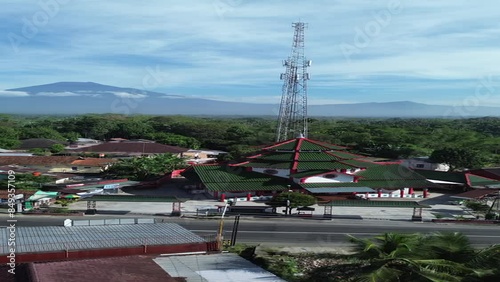 Aerial view of Cheng Ho mosque of Purbalingga with slamet mountain on background.  photo