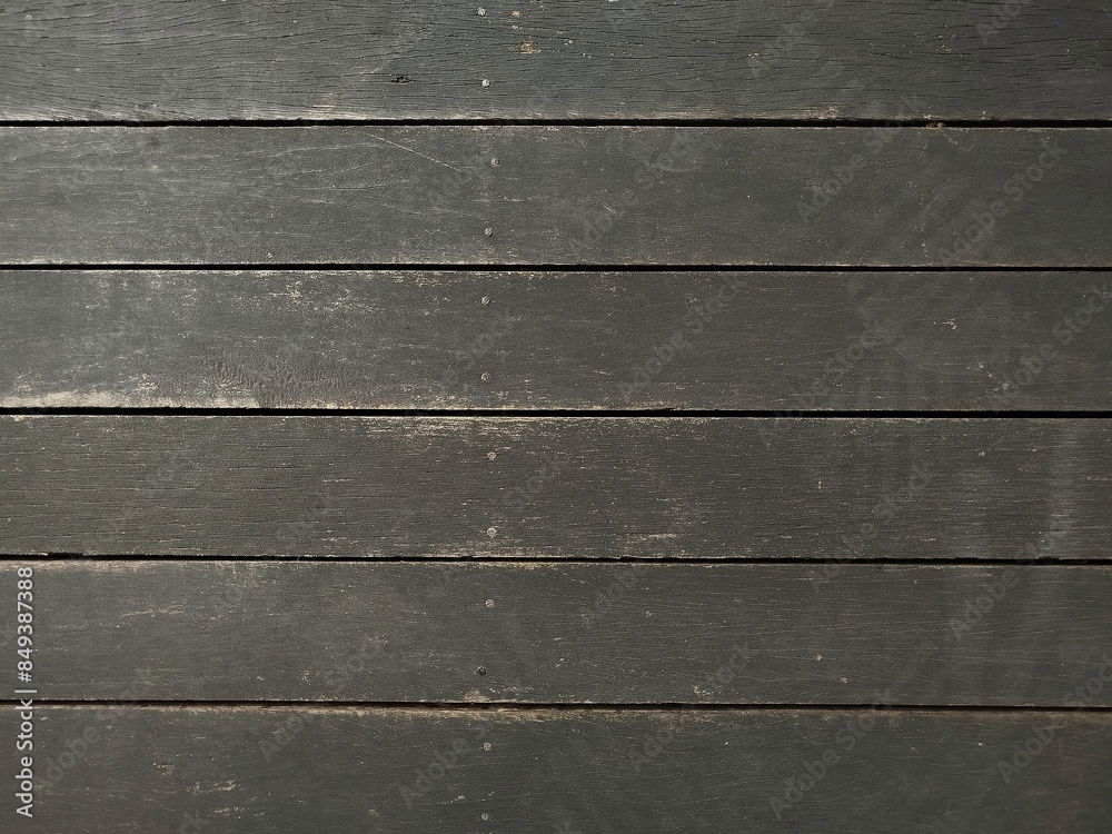 The wooden floor looks dirty and not clean. The wooden floor looks dirty and not clean.