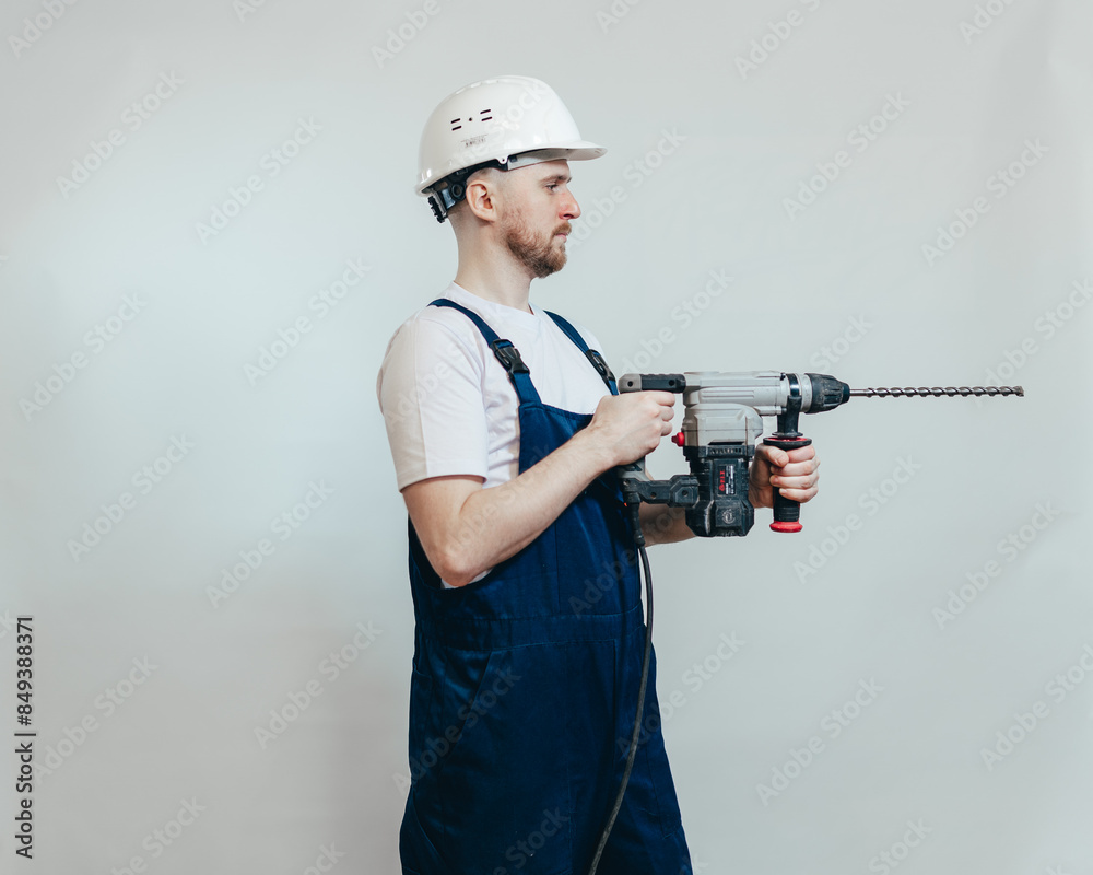 worker with a drill worker with a drill