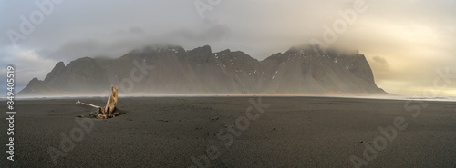 Vestrahorn, a 454 metre tall scree mountain, seen during the very early hours of the day arounf sunrise at the Stokksnes peninsula in southern Iceland photo