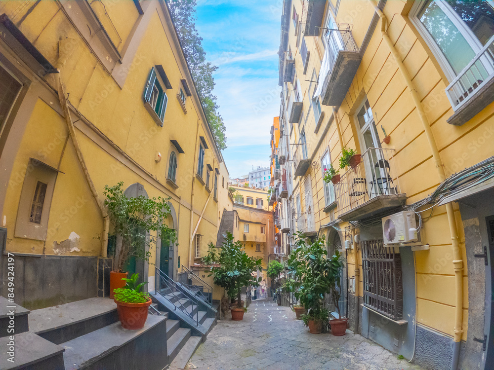 Fototapeta premium Narrow alley in Naples with fisheye effect