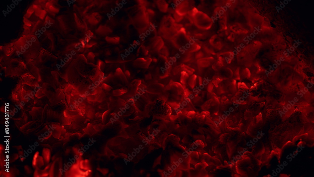 Fireplace in nature. Charcoal burning in a grill red and flaming embers. Rack focus. Fireplace in nature. Charcoal burning in a grill red and flaming embers. Rack focus.