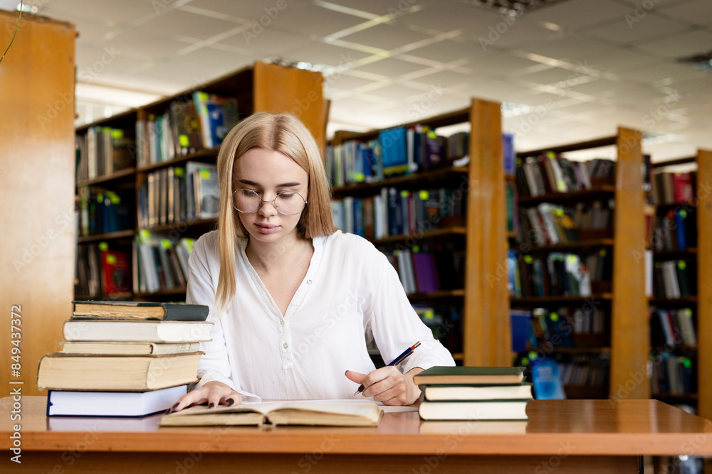 close-up of a young girl student holding a book in her hands, showcasing her passion for literature. She is deeply engaged in her reading, embodying the essence of exam preparation, scholarship, and s