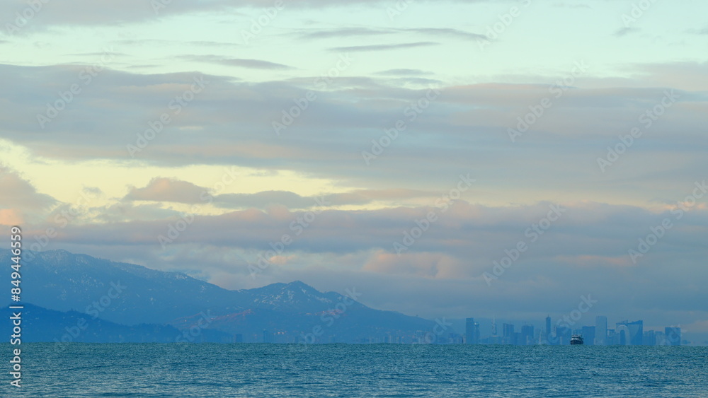 Obraz premium Silhouette Of A Metropolis By The Sea. Stunning Views Of The City Harbor. Batumi, Adjara, Georgia.