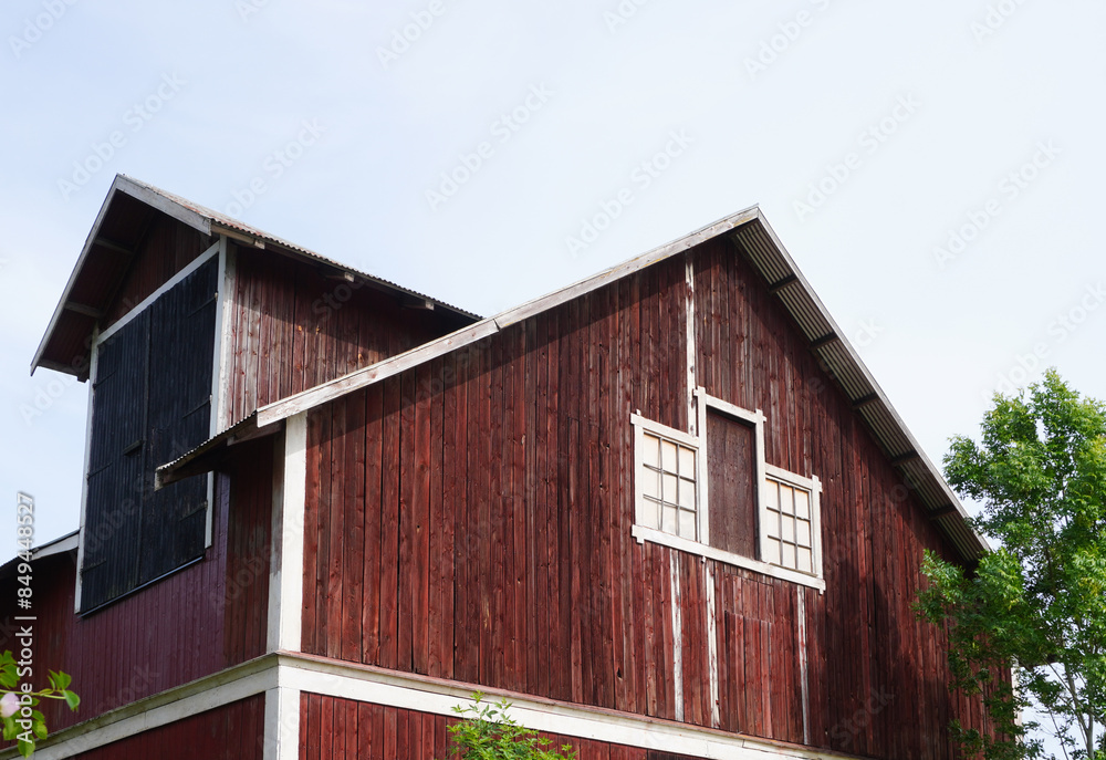 Low angle view of a barn building against the sky Low angle view of a barn building against the sky