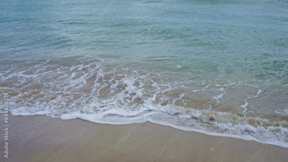 The serene shore of pescoluse beach in salento, puglia, italy, showcasing gentle waves against the sandy beach on a calm day. The serene shore of pescoluse beach in salento, puglia, italy, showcasing gentle waves against the sandy beach on a calm day.