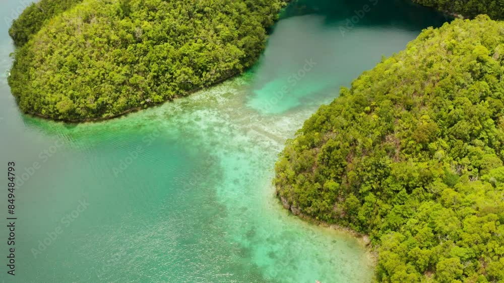 Aerial view of Sugba lagoon. Beautiful landscape with blue sea lagoon, National Park, Siargao Island, Philippines. Summer and travel vacation concept. Aerial view of Sugba lagoon. Beautiful landscape with blue sea lagoon, National Park, Siargao Island, Philippines. Summer and travel vacation concept.