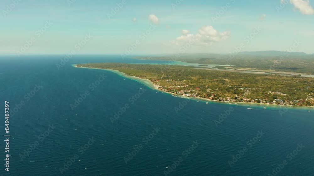 Shore with hotels near coral reef and diving boats, Moalboal, Philippines. Aerial view, Summer and travel vacation concept. Shore with hotels near coral reef and diving boats, Moalboal, Philippines. Aerial view, Summer and travel vacation concept.