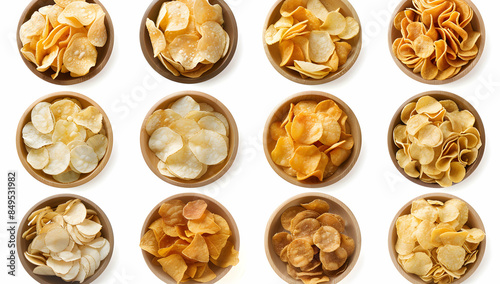 Collection of various flavored potato chips in bowls, isolated on a white background, top view photo