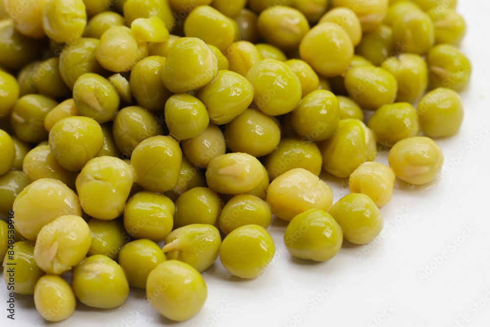 Canned green peas on white background. Canned green peas on white background.