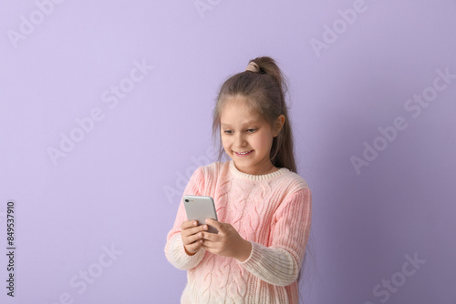Cute little girl in knitted...