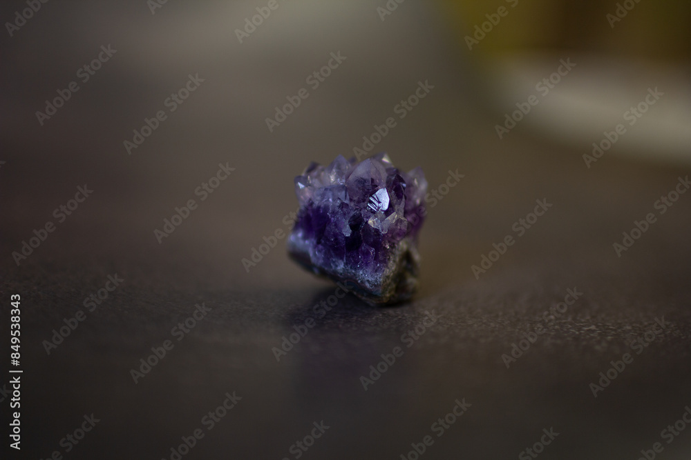 Violet amethyst quartz crystal on black background Violet amethyst quartz crystal on black background