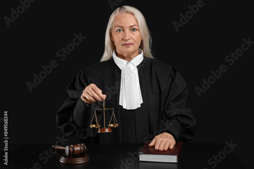 Mature female judge with sc...