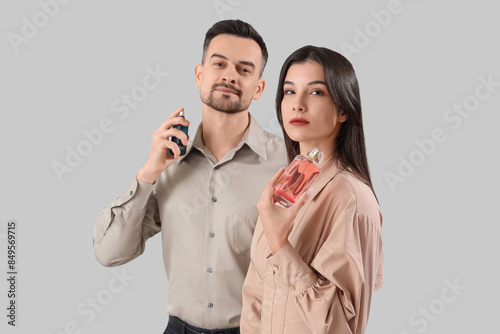 Young couple with bottles o...