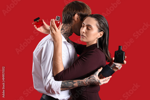 Young couple with bottles o...