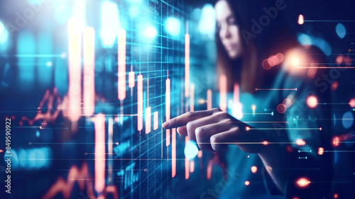 Wallpaper Mural Young woman interacting with futuristic digital financial graphs on a high-tech transparent screen. Torontodigital.ca