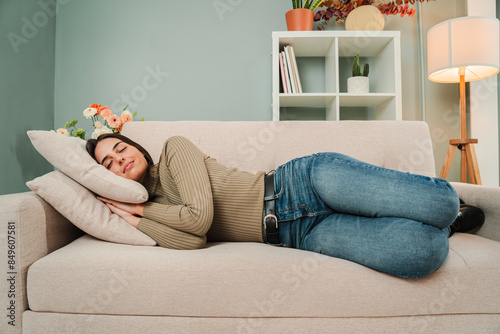 Принти на полотні Full leght view of a female napping at living room couch, having a good dream with positive expression
