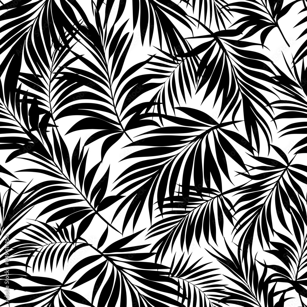 A monochrome design portrays a dense array of tropical palm leaves A monochrome design portrays a dense array of tropical palm leaves