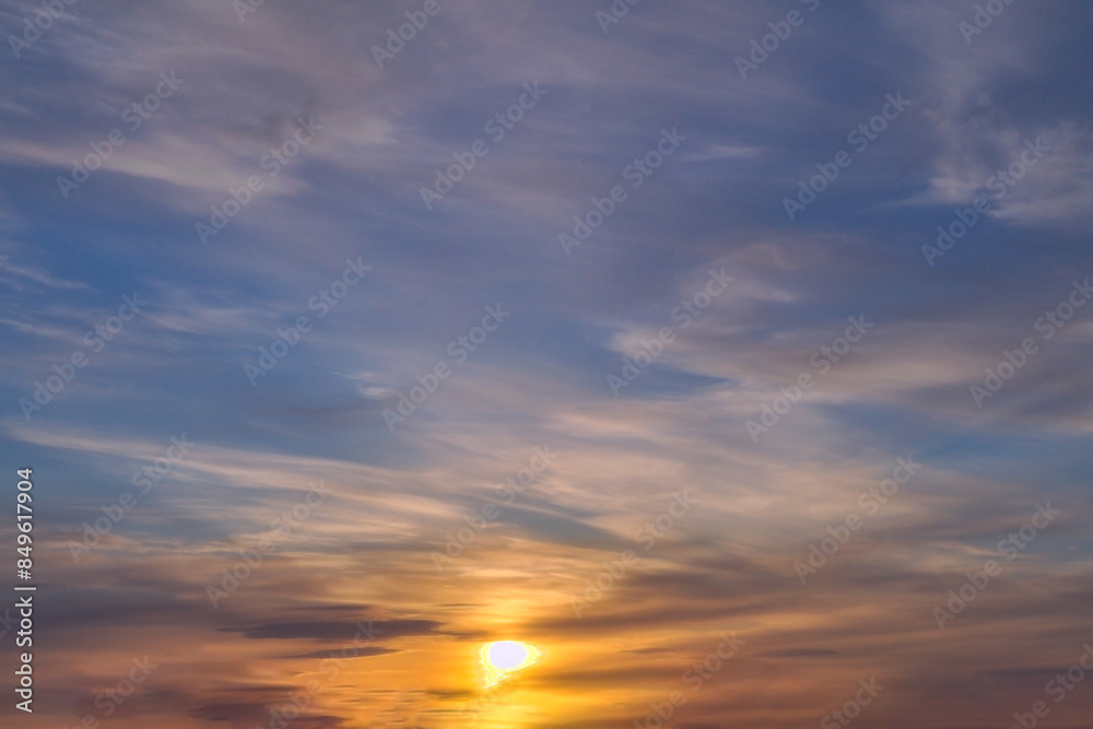 Summer evening sky in the picturesque clouds, lit by the rays of the setting sun. Summer evening sky in the picturesque clouds, lit by the rays of the setting sun.