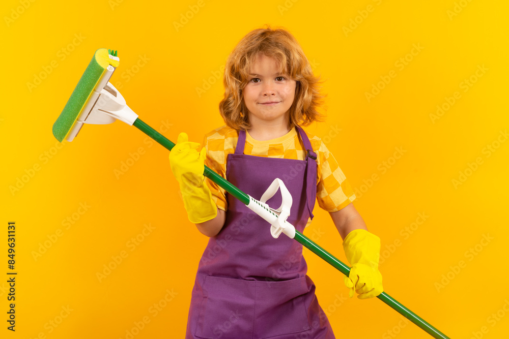 Child helping to clean. Child mopping house, cleaning home. Detergents and cleaning accessories. Cleaning service. Little boy housekeeping. Child helping to clean. Child mopping house, cleaning home. Detergents and cleaning accessories. Cleaning service. Little boy housekeeping.