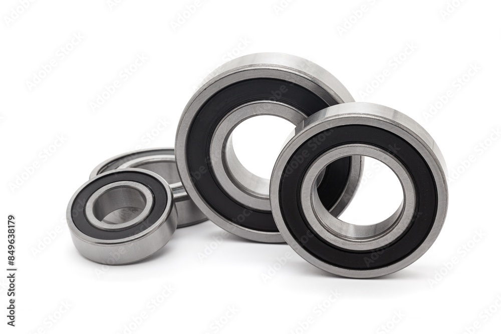 A set of various Tapered roller bearings, isolated on a white background. A set of various Tapered roller bearings, isolated on a white background.
