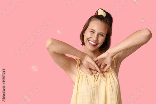 Teenage girl showing tongue...