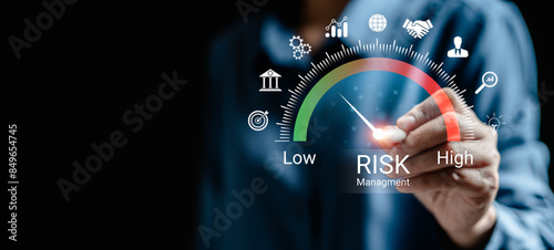 Businesswoman analyzing risk and opportunities to planning business via risk level indicator virtual rating low to high digital virtual, Risk management strategies concept. photo