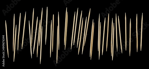 Foto Set wooden toothpicks isolated on black, clipping