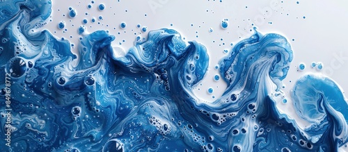 Closeup of electric blue liquid with bubbles photo